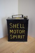 A Shell Motor Spirit fuel can with brass cap
