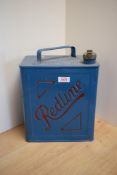 A Redline Fuel can with brass cap