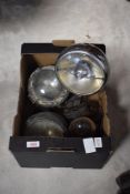 A box of vintage vehicle lights