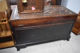 A traditional Chinese camphor wood bedding box , width approx. 103cm