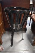 A cast iron torchere, height approx. 74cm