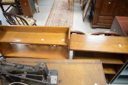 An oak four tier open bookcase each tier slightly graduating 92cm x 76cm sold tigether with an oak