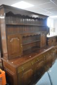 A late 19th or early 20th Century oak dresser , width approx. 183cm