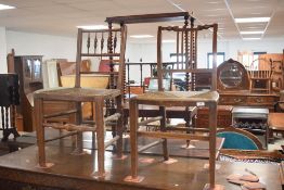 A set of three 19th Century rush seated chairs having turned spindle backs, plus one similar rail