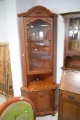 A Rossmoor Furniture double corner cupboard with glazed upper section 197.5cm