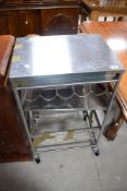 A modern stainless steel wine rack/kitchen trolley 90cm x 54cm x41cm