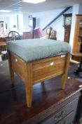 An Edwardian upholstered oak box stiil, later upholstered in tweed material 41cm x 38cm