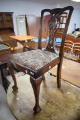 A reproduction mahogany Georgian design dining chair with pierced interlaced vase splat,