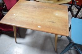 A light Elm unmarked but believed to be Ercol dining table, of rectangular form with angled