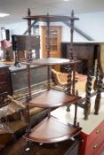 A reproduction mahogany four tier corner whatnot 103cm