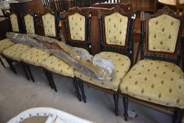 A set of six Victorian ebonised dining chairs having turned framed with bobbin turned supports to