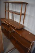 Three vintage Ercol 'Baby Giraffe' shelf units, each width approx. 91cm