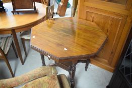 A Victorian mahogany occasional table having octagonal top and galleried undertier, diameter approx.