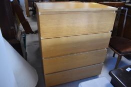 A modern laminate chest of four long drawers, width approx. 80cm