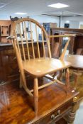 A child's Ercol style stick-back armchair 32cm seat height