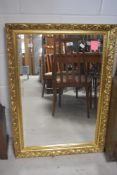 A gilt frame wall mirror, approx. 88 x 62cm