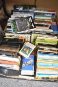 An assortment of books including titles 'The Chronicles of Milnthorpe' Roger Bingham and 'Kendal A