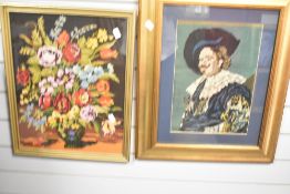 Two framed needlepoint tapestries, one depicting a portrait of 'The Laughing Cavalier' the over a
