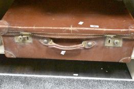 A large vintage suitcase 61cm x 35cm x 16cm