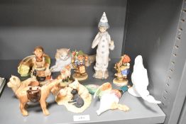 A miscellaneous selection of figures and animal studies to include a Nao by Lladro porcelain Cat and