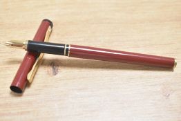 A Sheaffer TRZ Targa slim in burgundy with gold trim having Sheaffer nib