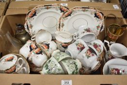 A Wetley China 'Mayo' pattern part dinner/tea service sold alongside a vintage copper and brass