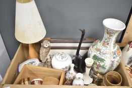 A large oriental baluster vase featuring floral motifs to white porcelain, a studio pottery