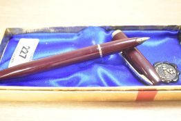 A boxed Sheaffer Imperial touchdown fill fountain pen in Burgundy with fold trim