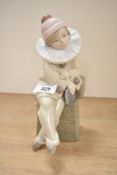 A Lladro porcelain figurine 'Little Jester' model number 5203, complete with box.