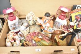 A pair of vintage Austrian porcelain ewers in red and white colourway with romantic scene to mid-