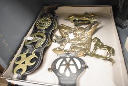 A cast brass German Sheperd wall plaque, h19cm, sold together with a pair of brass horses,