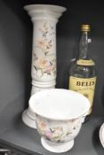 A vintage Royal Winton Jardiniere sold along with a large Bells Old Scotch Whiskey bottle