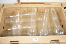 A carton of eleven large vintage oil lamp glass flutes.