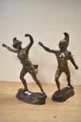 A pair of brass gladiators/spear throwers, missing their weapons, without any markings/signatures