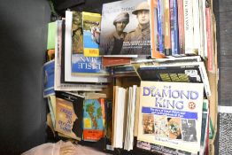 An assortment of books including titles 'The Diamond King' Brian Mylchreest and 'This Terrible