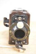 A vintage Dux Episcop bakelite projector with box, sold together with a stamp album