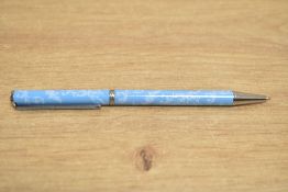 A boxed Clarance House ballpoint pen in pale blue with foliated decal