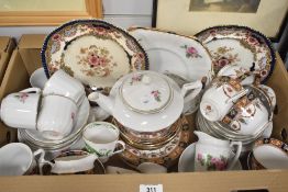 A quantity of white porcelain part dinner/tea service having pink floral motifs sold together with