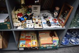 A large assortment of Andy Cap collectibles and memorabilia to include bottle openers, pin badges,