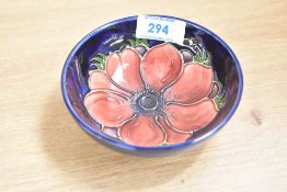A small Moorcroft Pottery 'Anemone' pattern footed bowl, diameter measures 11cm.