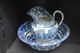 A Scottish Spongeware blue and white porcelain wash bowl and jug.