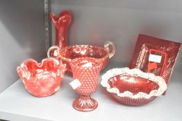 A ruby red glass basket vase having shaped handles, w20cm, sold together with various studio glass (