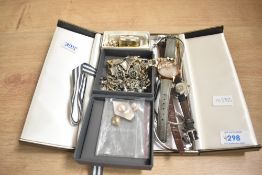 An assortment of costume jewellery, including a vintage marcasite floral scroll necklace, a Radley