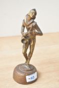 A heavy Art Deco style gilt patinated spelter figure depicting a saxophone player, no markings/