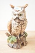 A ceramic painted Grafenthal Owl study perched on a tree stump, measuring 26cm tall.