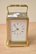 A French brass five-glass repeating carriage time piece, with visible escapepent and repeater button