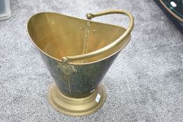 A large vintage brass coal bucket, measures 31cm tall.