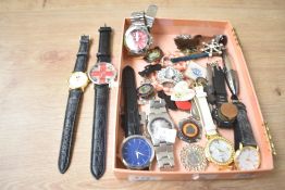 A collection of costume jewellery, including wristwatches, brooches and an Elizabeth II six pence in