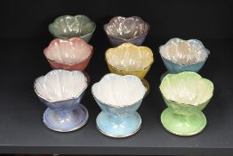 A group of eight Maling Ware lustre dessert bowls/sundae dishes in various colours.