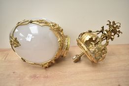 A large attractive gilt metal and glass pendant light fitting and shade, decorated with moulded